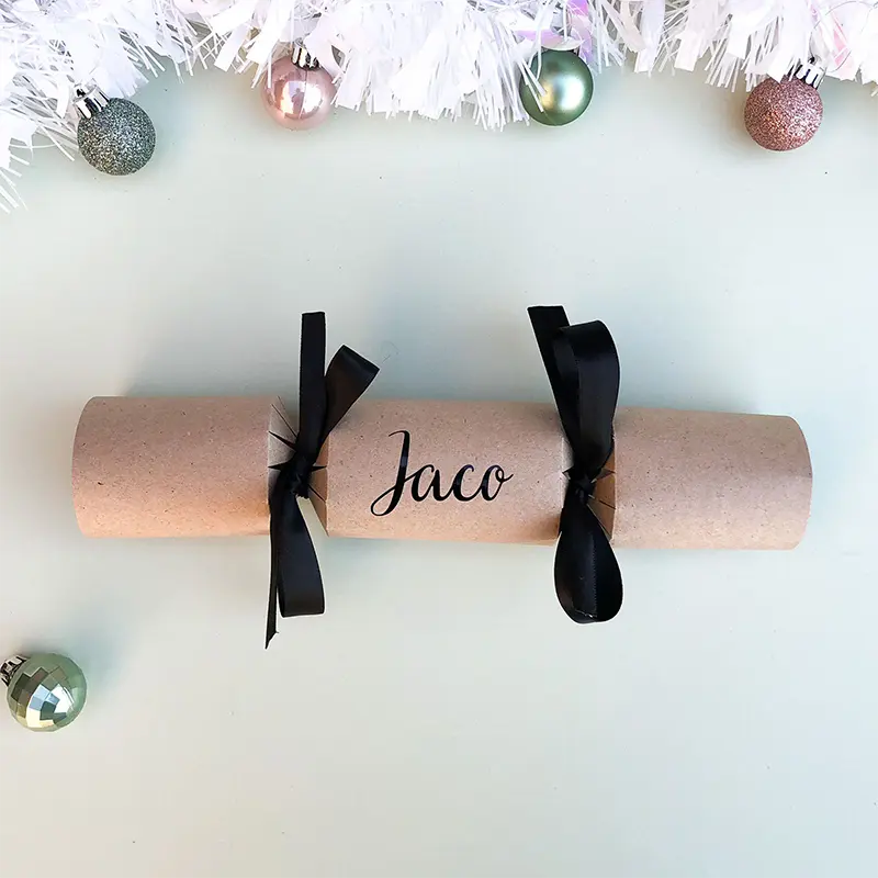DIY Personalised Christmas Cracker in black with cursive font Sample of DIY Personalised Christmas Cracker in black with name in cursive font