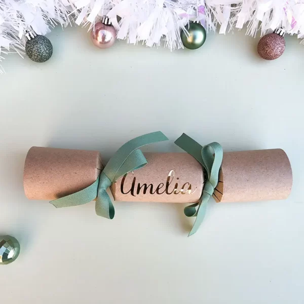 Sample of DIY Personalised Christmas Cracker in sage with name in gold cursive font