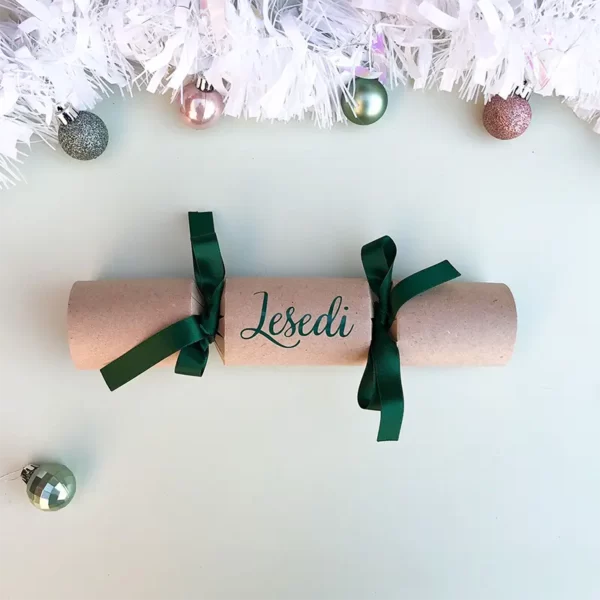 Sample of DIY Personalised Christmas Cracker in green with name in cursive font