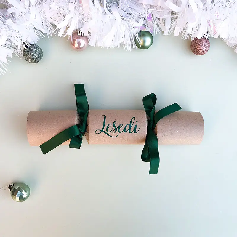 DIY Personalised Christmas Cracker in green with cursive font Sample of DIY Personalised Christmas Cracker in green with name in cursive font