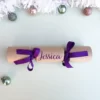cursivePurpleCracker Sample of DIY Personalised Christmas Cracker in purple with name in cursive font
