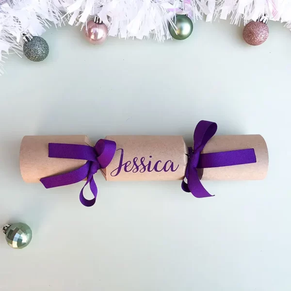 Sample of DIY Personalised Christmas Cracker in purple with name in cursive font