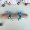 cursiveTurquoiseCracker Sample of DIY Personalised Christmas Cracker in turquoise with name in cursive font