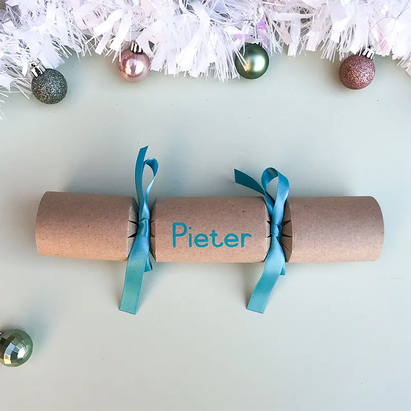 easyReadingTurquoiseCracker Image of sample of DIY Personalised Christmas Cracker in turquoise with name in easy-reading font